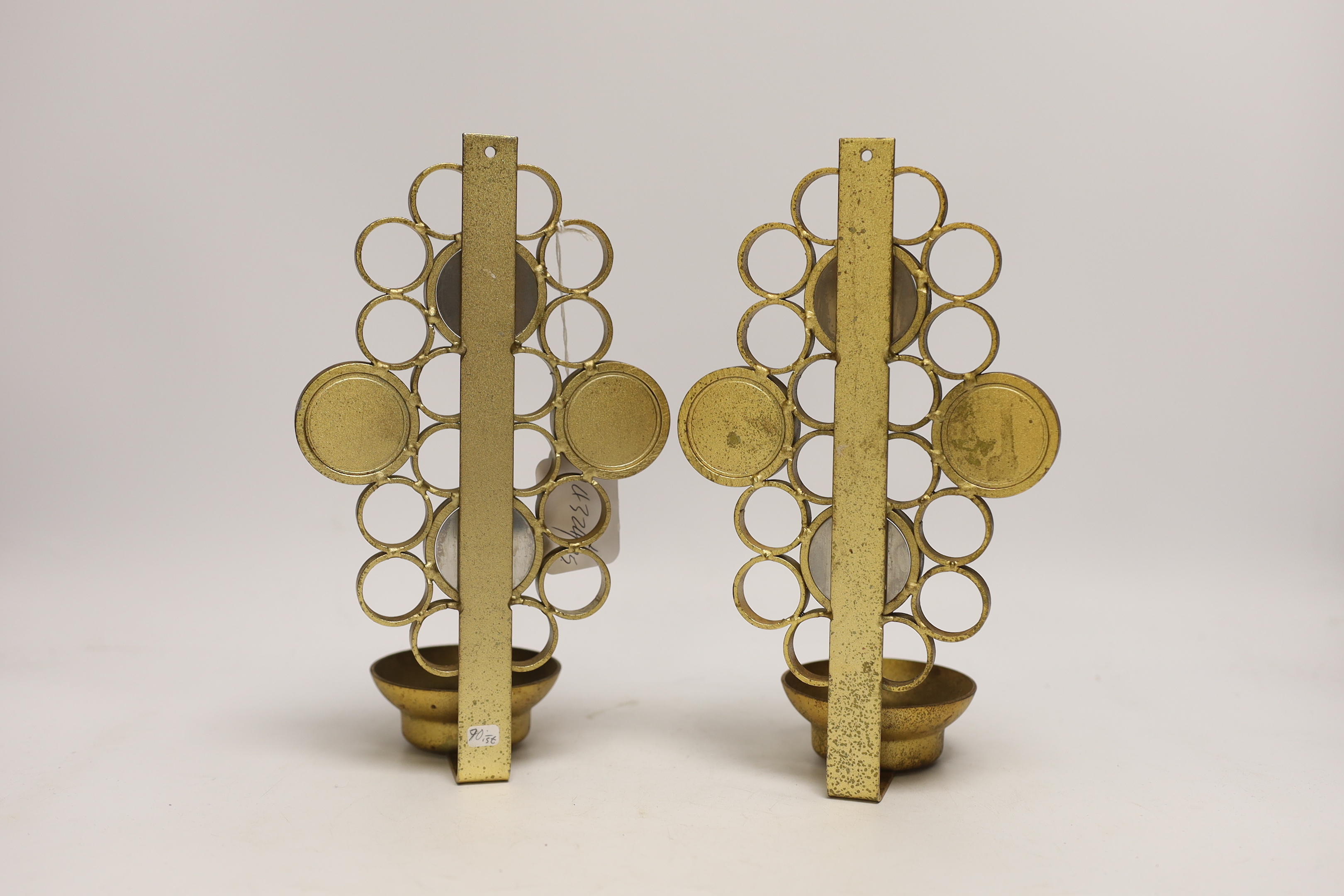 A pair of 1960's mirrored and gilt metal wall sconces, 35cm high